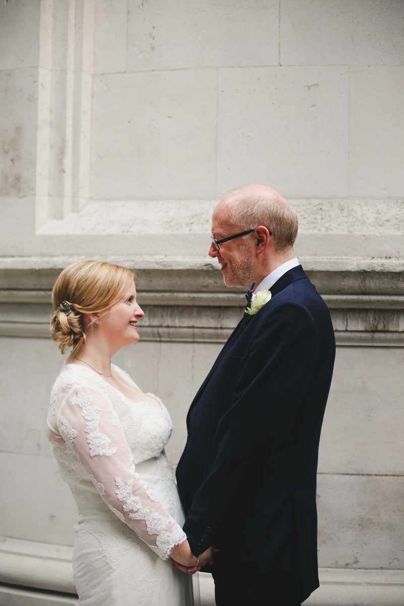 Bride and groom portrait at the national liberal club London by Love oh love photography