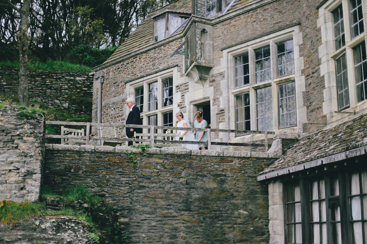 Walking down the aisle at Prussia Cove, Cornwall wedding by Love Oh Love Photography