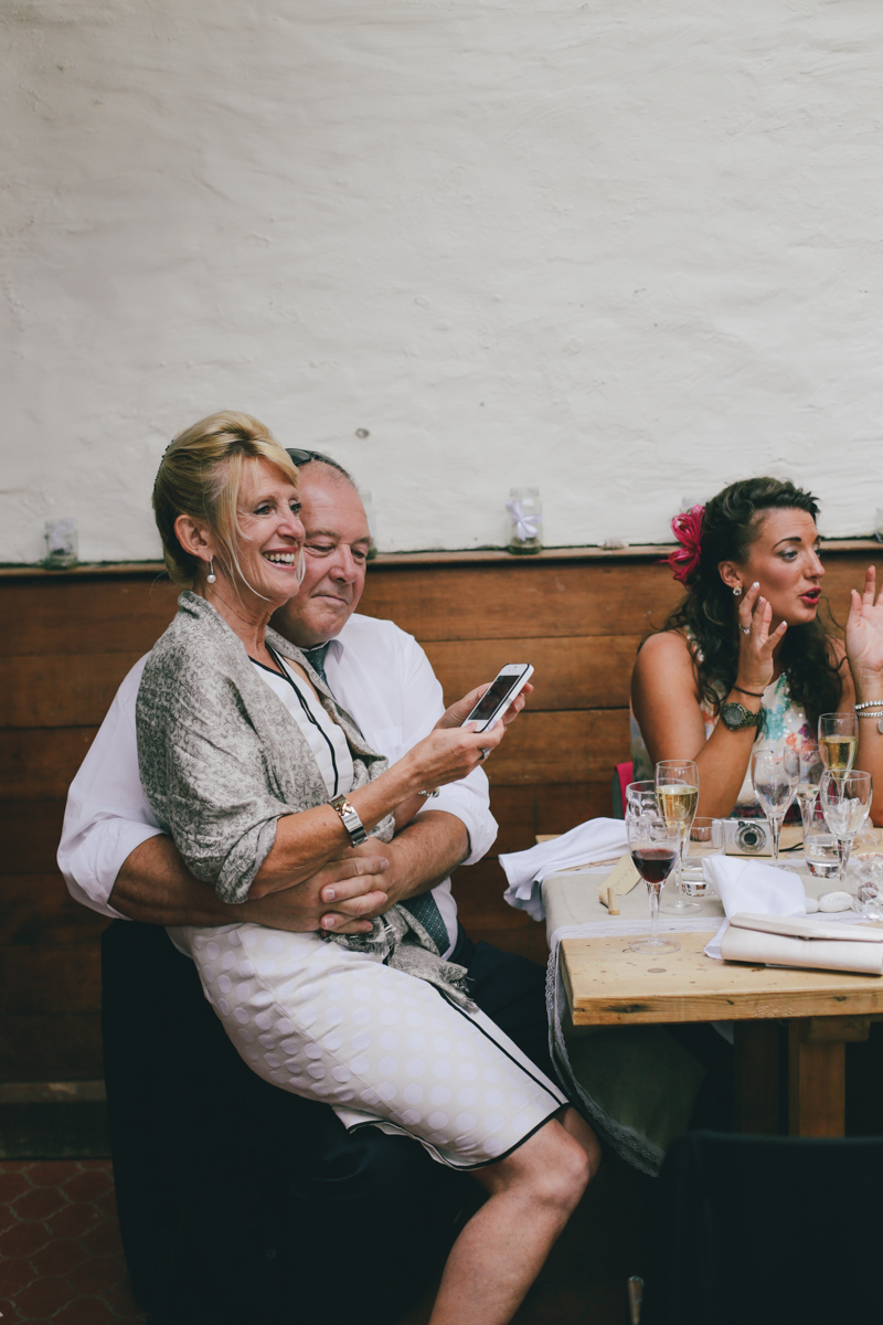 Candid shot at Prussia Cove, Cornwall wedding by Love Oh Love Photography
