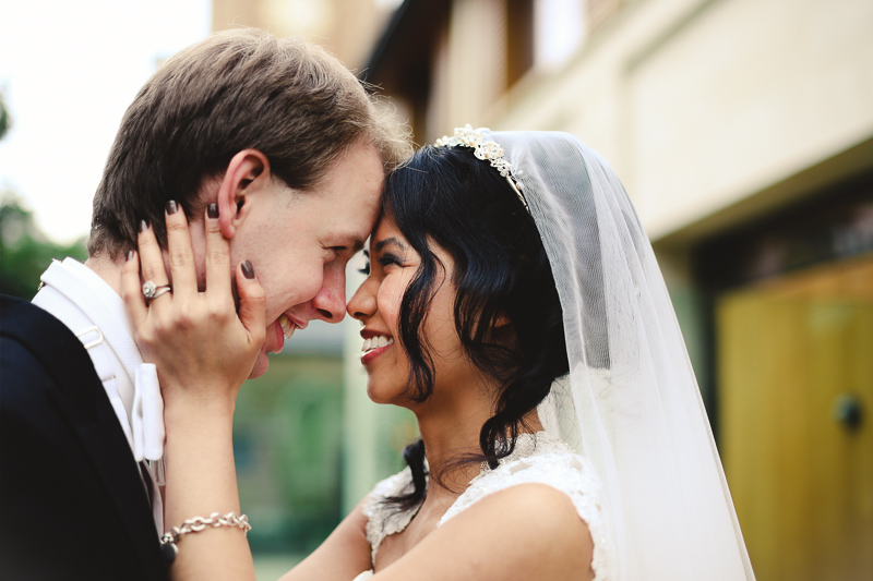 happy bride and groom by Love oh Love photography