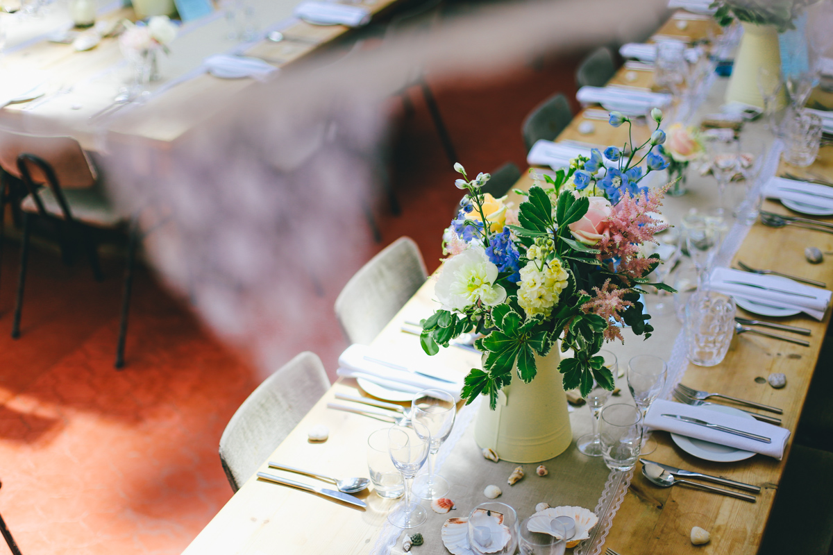 Table decorations at Prussia Cove, Cornwall Wedding by Love Oh Love Photography