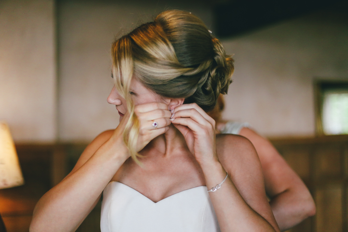 Cameras and bride at Prussia Cove, Cornwall wedding by Love Oh Love Photography
