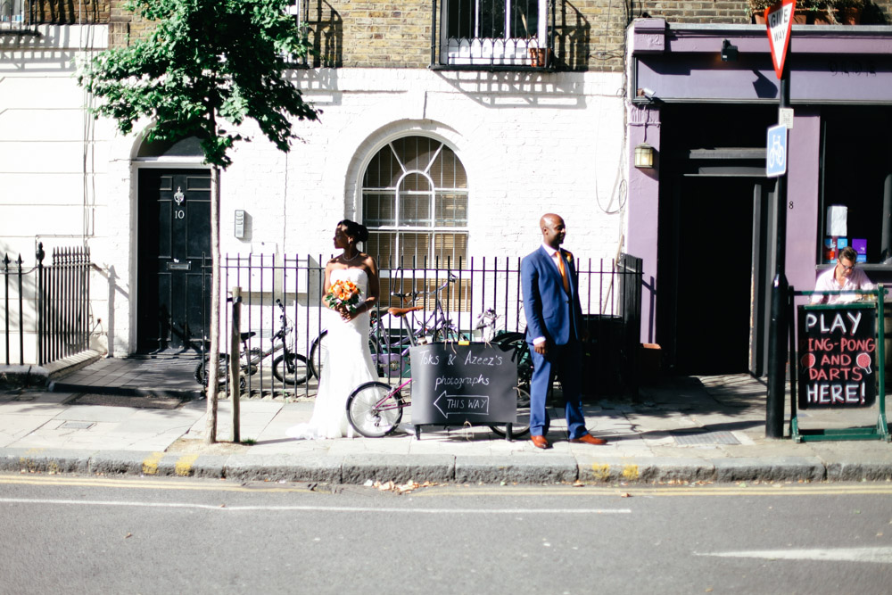 Bride and groom at Old Finsbury Town Hall, London by Love oh Love photography